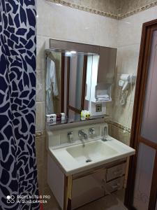 Salle de bains dans l'établissement Hotel KARAVAN