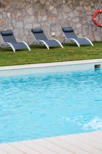 Бассейн в Hotel Nómadas или поблизости