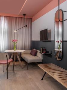 TV a/nebo společenská místnost v ubytování Sorell Hotel City Weissenstein - Boutique Hotel
