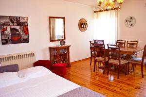 Posteľ alebo postele v izbe v ubytovaní San Rocco Sqr. Apartment