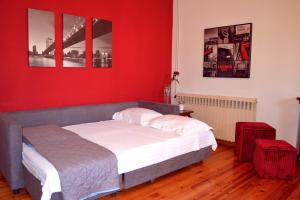 Posteľ alebo postele v izbe v ubytovaní San Rocco Sqr. Apartment