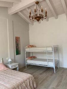 Postel nebo postele na pokoji v ubytování B&B Nonna Teresa
