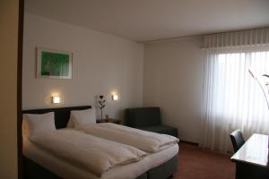 Letto o letti in una camera di Hotel Eremitage