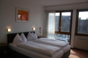Letto o letti in una camera di Hotel Eremitage