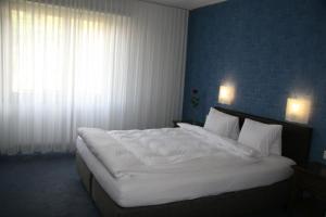 Letto o letti in una camera di Hotel Eremitage