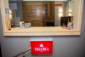 The lobby or reception area at Hotel Villa Rica