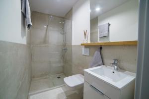 Kylpyhuone majoituspaikassa BOHO Apartments