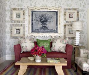 
a living room filled with furniture and flowers at The Whitby Hotel in New York
