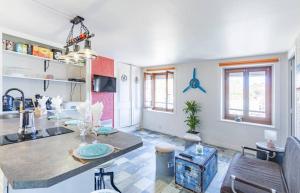 a kitchen with a counter top in a room at Chipote by Carl-Emilie in Épinal