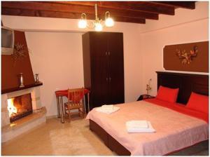 Ένα ή περισσότερα κρεβάτια σε δωμάτιο στο Ξενώνας Λίνα +8 φωτογραφίες