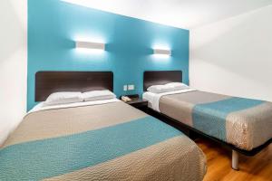 Postel nebo postele na pokoji v ubytování Motel 6-Lewisville, TX - Medical City