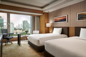 เตียงในห้องที่ InterContinental Saigon, an IHG Hotel