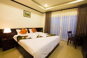 Afbeelding uit fotogalerij van Douangchan Plaza Hotel in Vientiane +32 foto's