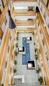 an overhead view of the lobby of a building at The Altruist Navi Mumbai Hotel in Navi Mumbai