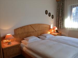 Katil atau katil-katil dalam bilik di Hotel Garni Senn