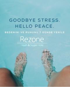 a persons feet in the water with the words goodbye stress hello peace at Rezone Health & Oxygen Hotel Kazdağları in Altınoluk