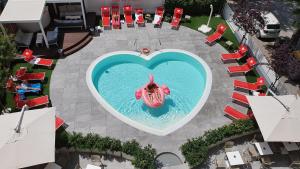 Bazén v ubytování Hotel Sabrina Rimini nebo v jeho okolí