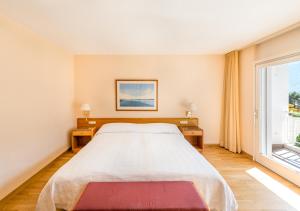Hôtel des Bains de Saillon客房内的一张或多张床位