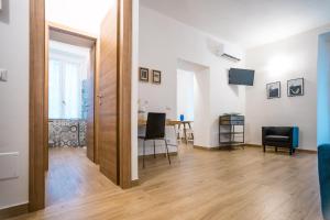 TV a/nebo společenská místnost v ubytování Valle dei Mulini - Apartment