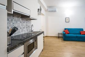 Kuchyň nebo kuchyňský kout v ubytování Valle dei Mulini - Apartment