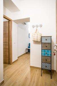 Postel nebo postele na pokoji v ubytování Valle dei Mulini - Apartment