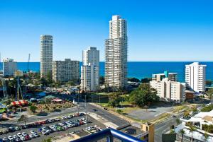 a city skyline with tall buildings and a parking lot at Centrepoint Resort in Gold Coast