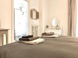 A bed or beds in a room at A Quattro Passi Da Még 32 kép