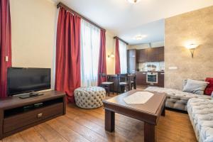 TV o dispositivi per l'intrattenimento presso Videviku Villa Apartments