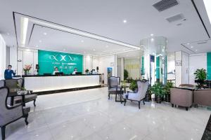 Lobby alebo recepcia v ubytovaní Xana Hotelle Hangzhou Xiaoshan International Airport