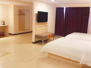 Cama o camas de una habitación en 7Days Premium Guiyang North Station