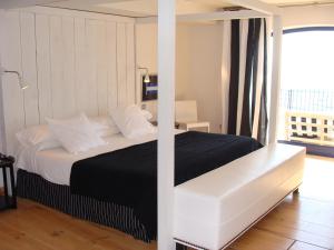 Postel nebo postele na pokoji v ubytování Hotel Trias