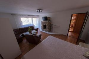 Televízia a/alebo spoločenská miestnosť v ubytovaní Apartment Lucky Liptov