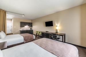 Postel nebo postele na pokoji v ubytování Residency Suites