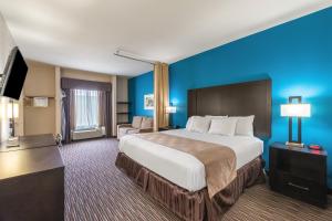 Postel nebo postele na pokoji v ubytování Residency Suites