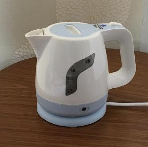 a white blender sitting on top of a table at Coco Fukuoka Chiyo in Fukuoka