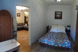 Giường trong phòng chung tại Apartments on Parhomenko st.