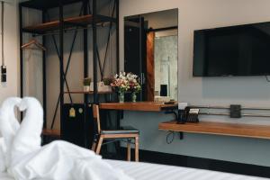 TV a/nebo společenská místnost v ubytování OU HOTEL