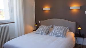 Letto o letti in una camera di Hotel Savel