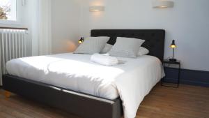Letto o letti in una camera di Hotel Savel