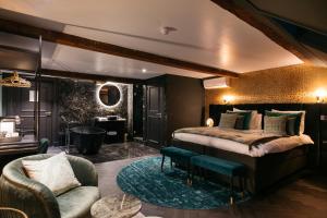 Ένα ή περισσότερα κρεβάτια σε δωμάτιο στο Hotel Britannique