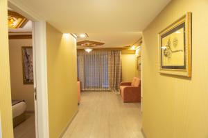 A seating area at Empire Suite Hotel