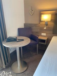 Postel nebo postele na pokoji v ubytování Hotel in den Herrnwiesen