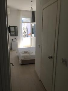 Ванна кімната в R HOUSE HOTEL