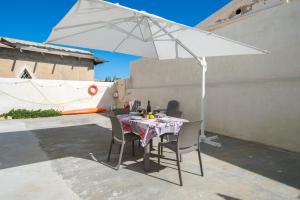 Balkón alebo terasa v ubytovaní Holiday Onde di Sicilia