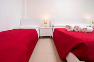 Posteľ alebo postele v izbe v ubytovaní Holiday Onde di Sicilia
