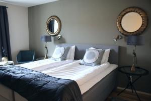 Hotel Carlshamn 객실 침대