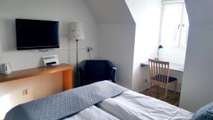 Hotel Carlshamn 객실 침대