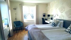 Hotel Carlshamn 객실 침대