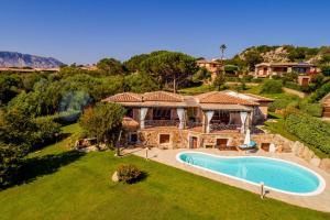 Bazén v ubytování Villa Danza dei Fenicotteri nebo v jeho okolí