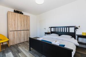 Katil atau katil-katil dalam bilik di Apartmán Háje - V srdci Tatier